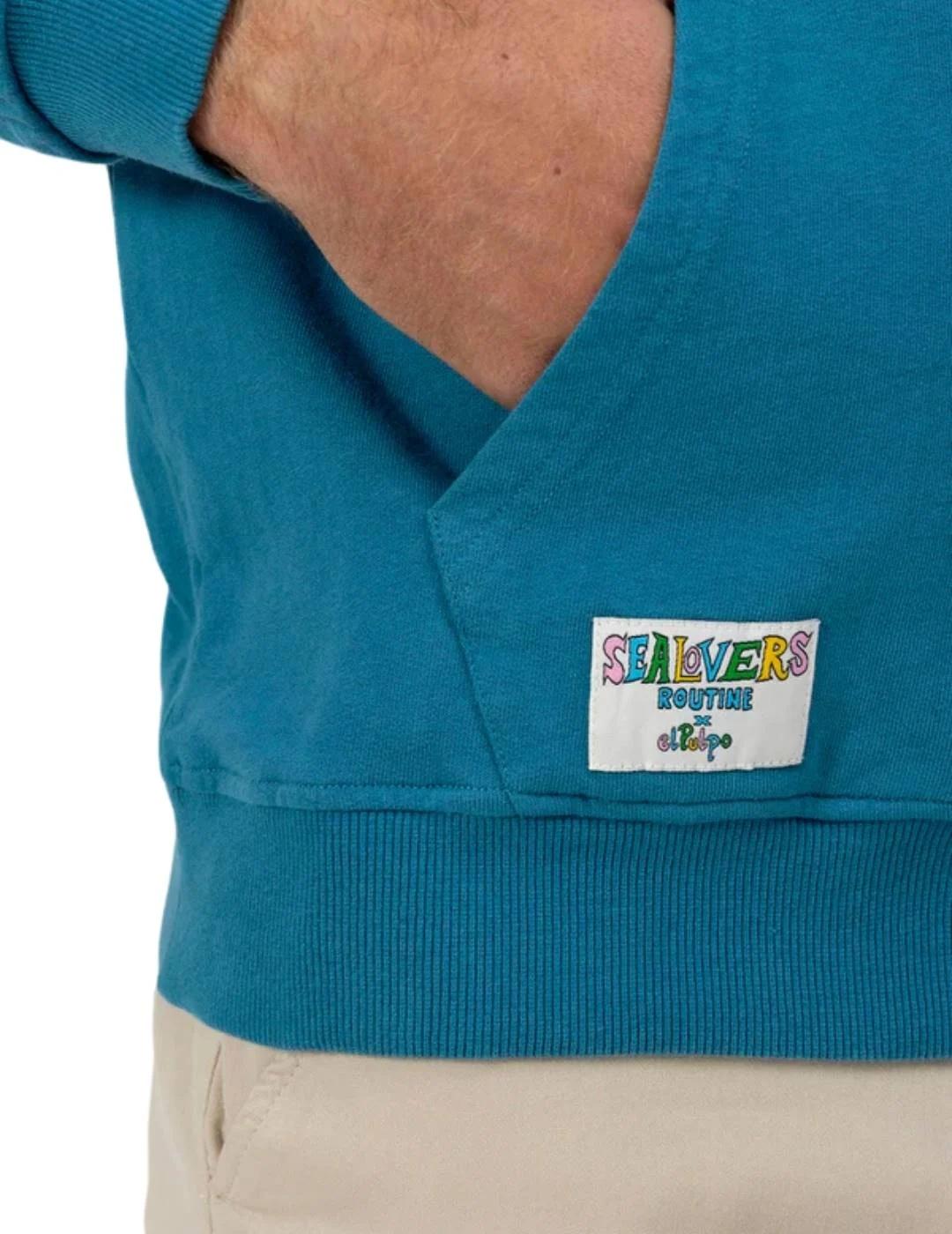 El Pulpo Sudadera Azul pick up surfboard