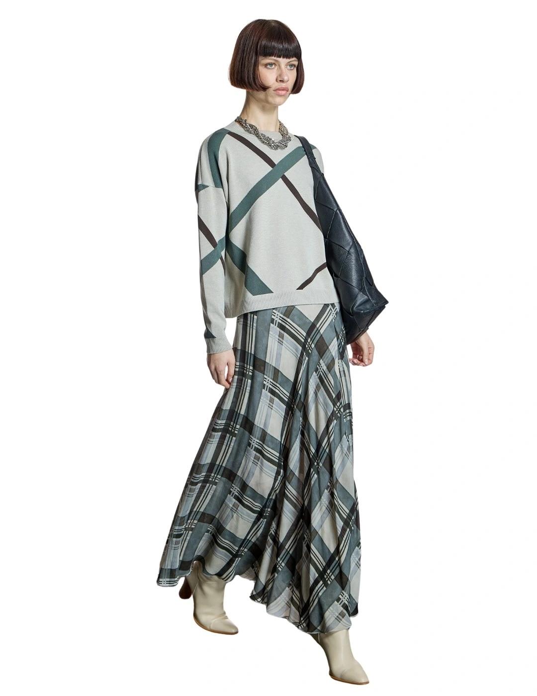 Alba Conde Jersey Piedra con diseño geométrico