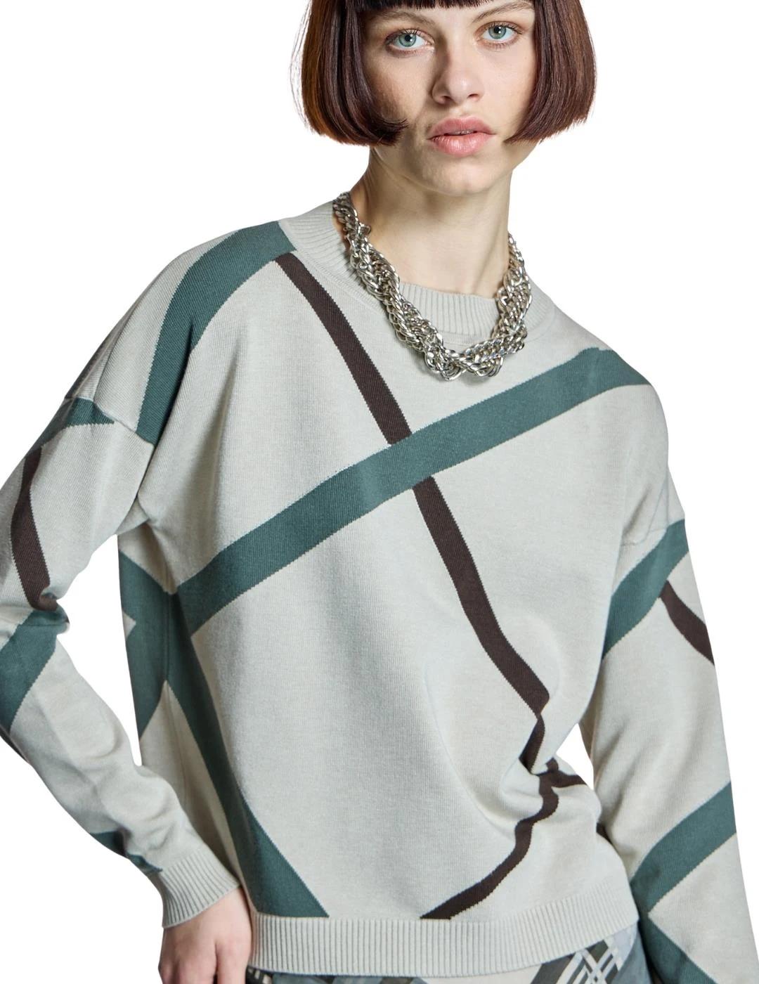 Alba Conde Jersey Piedra con diseño geométrico